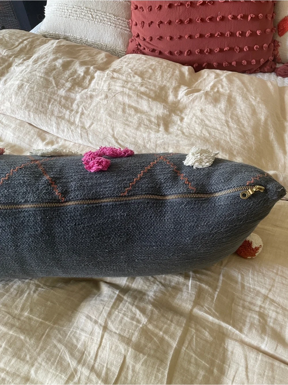 Anthropologie Charcoal Lumbar Pillow with Coral, Pink & Cream Accents